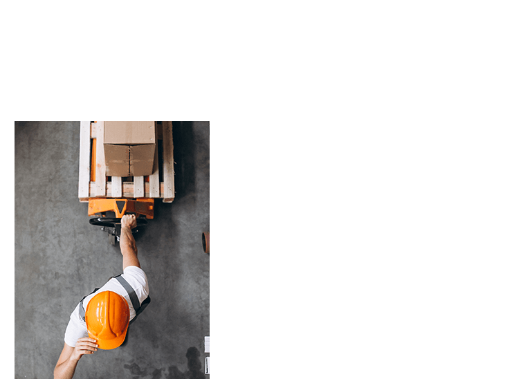 A warehouse staff handling a pallet.