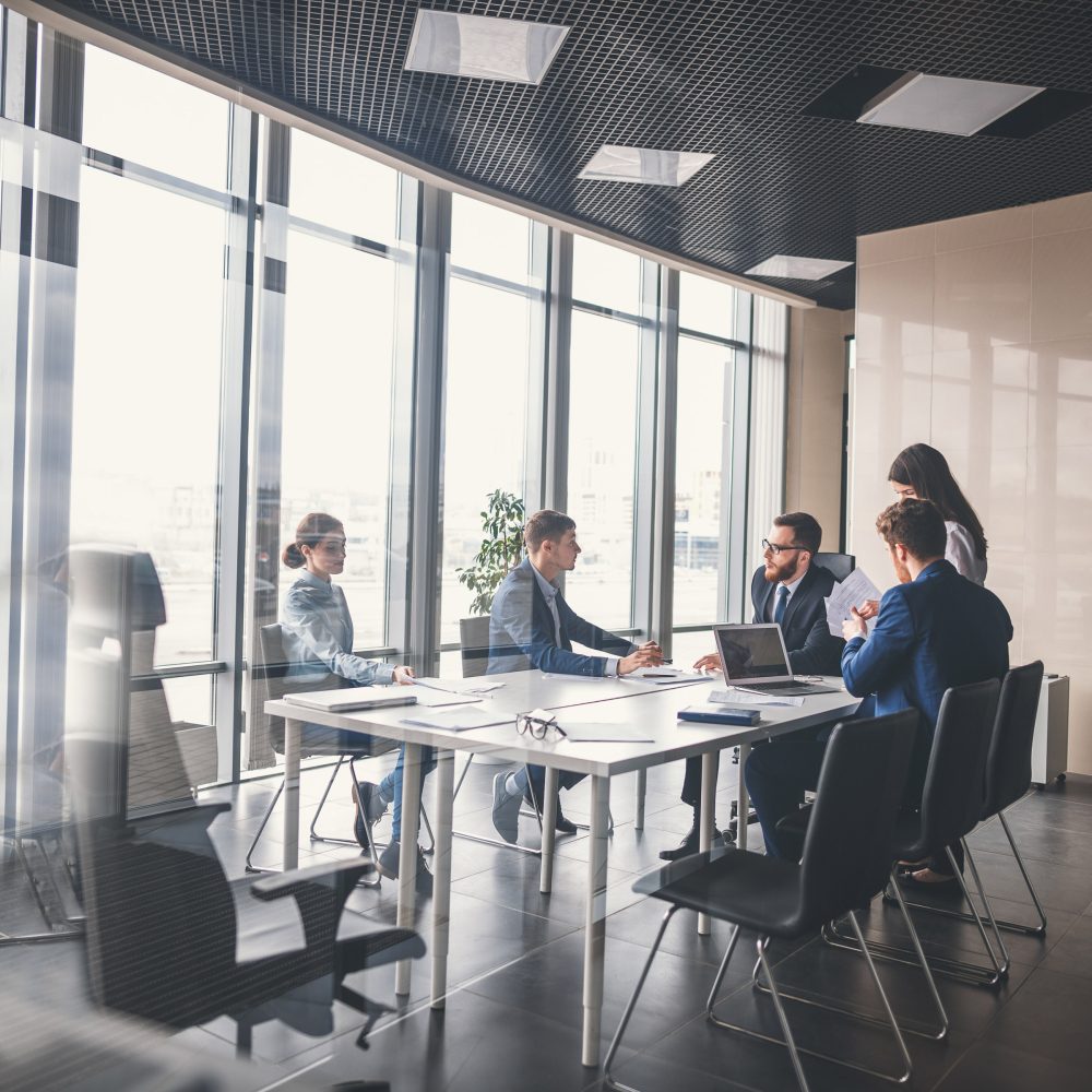 Corporate business team and manager in a meeting.